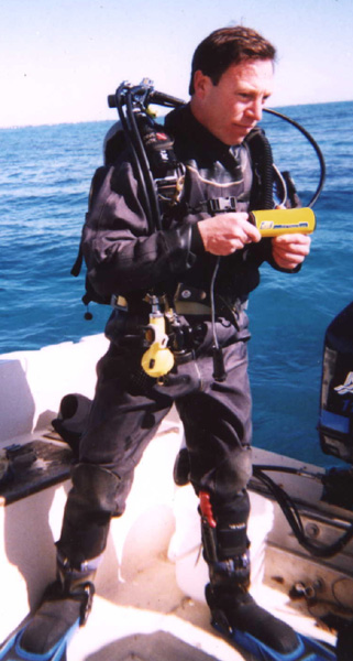A diver holding a MC-1