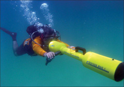 A man under water using a DM-1