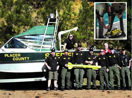 Members of Placer County Sheriffs Dept with their JW Fishers SSS-100K/600K side scan sonar; Inset: Snohomish Sheriff Dept deputies with the SeaLion-2 ROV nicknamed 'Batman'