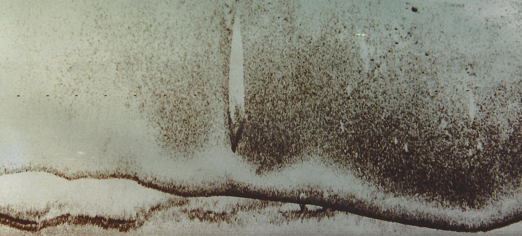 Image of a boat on lake bottom from original side scan sonar on thermal paper in 1992