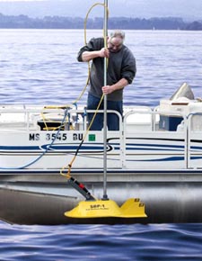 Man about to deploy Sub Bottom Profiler (SBP) in the water