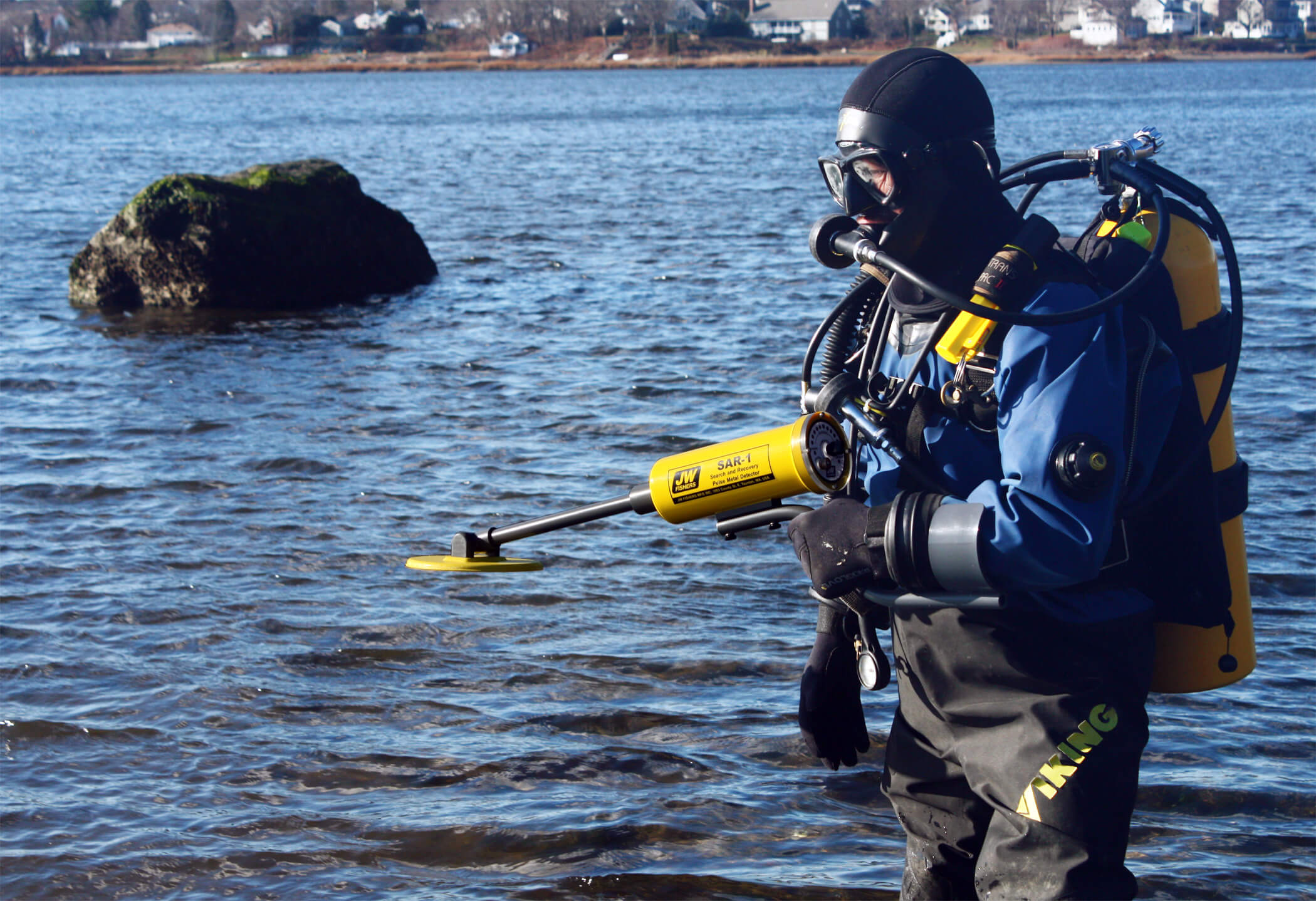 Man holding Search And Recovery Metal Detector (SAR)
